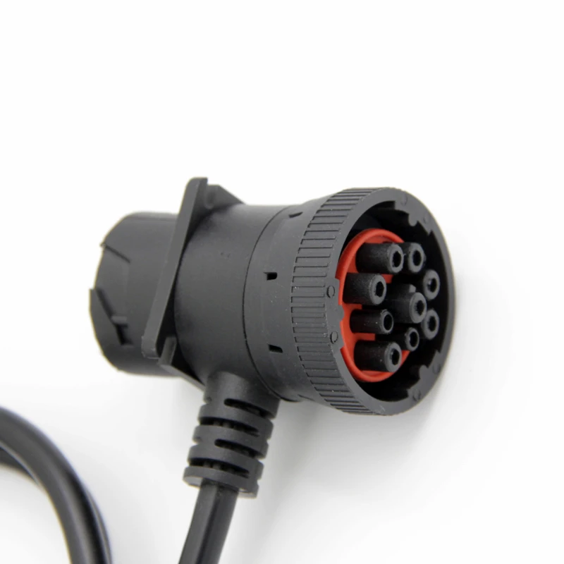 Deutsch 9-Pin Male connector close-up showing the red sealing ring and gold-plated pins.