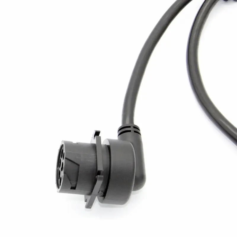 Close-up of J1939 90-degree right angle connector showing over-molded strain relief for tight spaces.