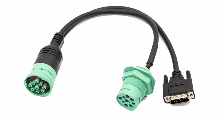 J1939 9-pin male connector plugged into truck port connected to a DB15 data logger via adapter cable